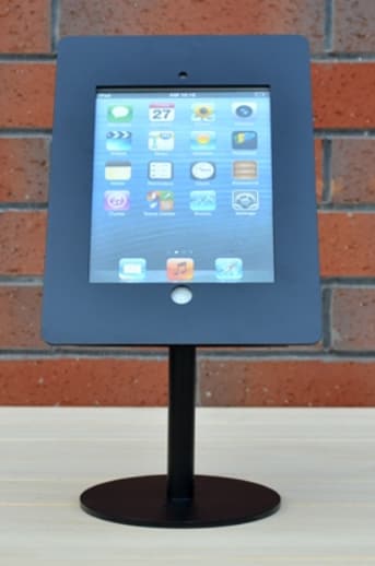 Black table stand with an iPad locked into its housing